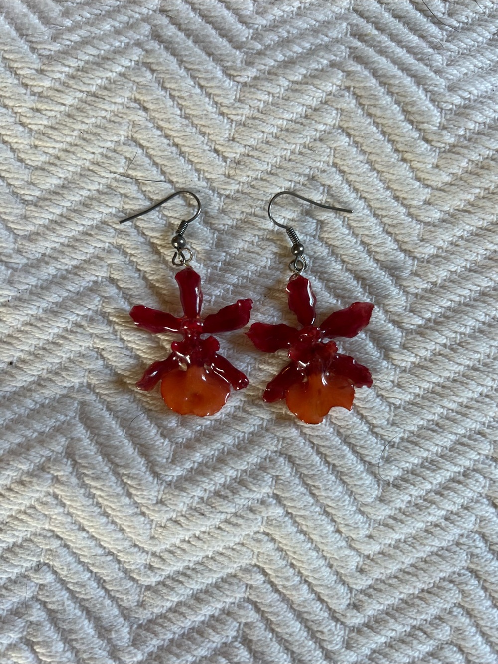 handcrafted earrings made from real orchid flowers in resin